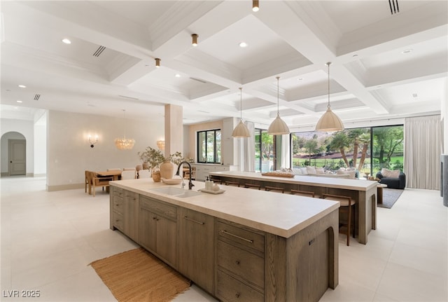 15 Vintage Canyon St, Las Vegas, NV 89141 - kitchen with a large island with sink, plenty of natural light, and a sink