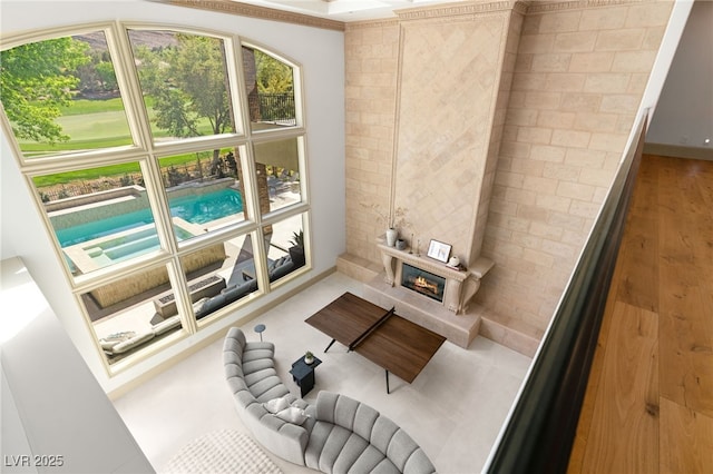 15 Vintage Canyon St, Las Vegas, NV 89141 - living area with a glass covered fireplace and wood finished floors
