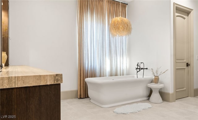 15 Vintage Canyon St, Las Vegas, NV 89141 - full bathroom with tile patterned floors and a freestanding tub