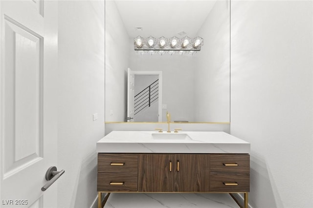 2236 Timber Rose Dr, Las Vegas, NV 89134 - bathroom with marble finish floor, baseboards, and vanity