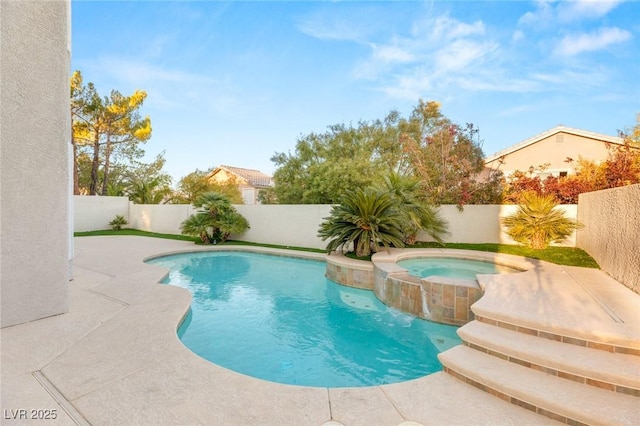 2236 Timber Rose Dr, Las Vegas, NV 89134 - view of swimming pool featuring a fenced backyard, a pool with connected hot tub, and a patio