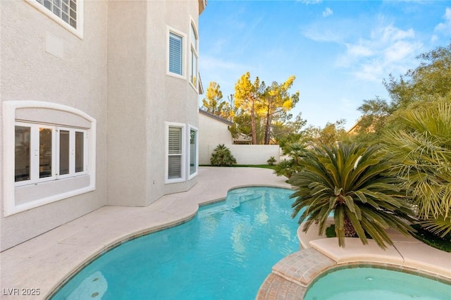 2236 Timber Rose Dr, Las Vegas, NV 89134 - view of swimming pool with a fenced in pool, a patio area, an in ground hot tub, and fence