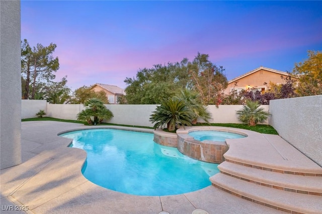 2236 Timber Rose Dr, Las Vegas, NV 89134 - view of swimming pool featuring a patio, a pool with connected hot tub, and a fenced backyard
