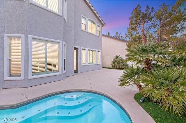 2236 Timber Rose Dr, Las Vegas, NV 89134 - pool at dusk with a patio area
