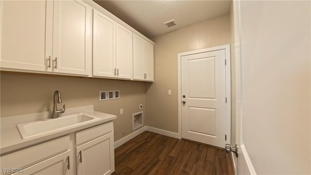 1931 Rose Ct, Pahrump, NV 89048 - laundry room featuring hookup for an electric dryer, hookup for a washing machine, cabinet space, and dark wood-style floors