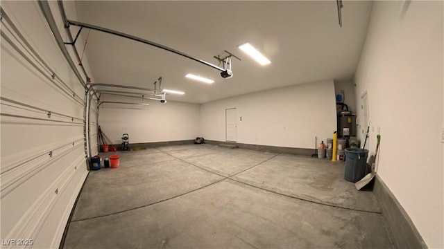 1931 Rose Ct, Pahrump, NV 89048 - garage featuring secured water heater and a garage door opener