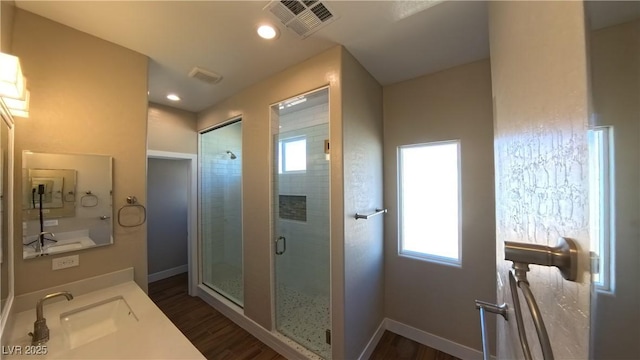 1931 Rose Ct, Pahrump, NV 89048 - full bath with healthy amount of natural light, wood finished floors, a shower stall, and recessed lighting