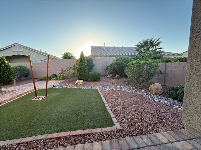 view of yard featuring a fenced backyard