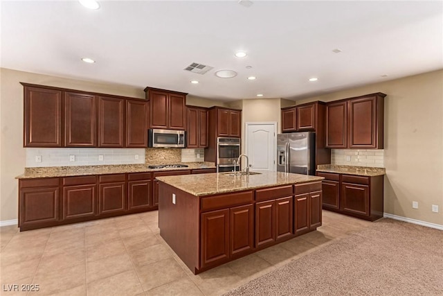 kitchen with stainless steel appliances, tasteful backsplash, baseboards, and recessed lighting