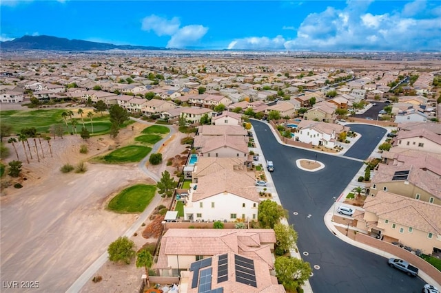 birds eye view of property with a mountain view and a residential view