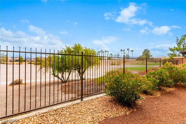 view of gate featuring fence