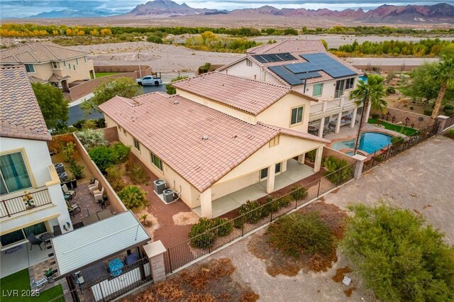 aerial view featuring a mountain view and a residential view