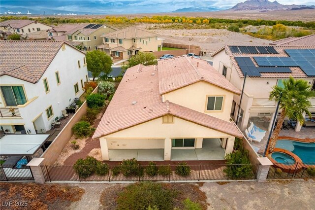 drone / aerial view with a mountain view and a residential view