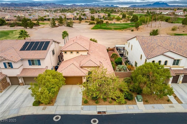 bird's eye view featuring a mountain view and a residential view