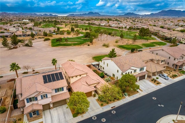 bird's eye view with a mountain view, a residential view, and view of golf course