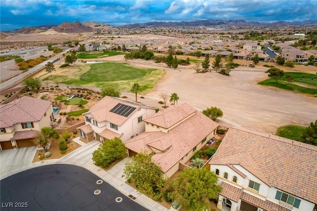 aerial view with a mountain view and a residential view