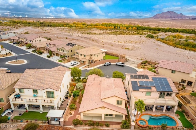 birds eye view of property with a residential view and a mountain view