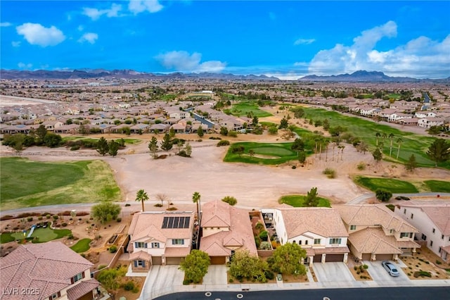 birds eye view of property featuring a mountain view, golf course view, and a residential view