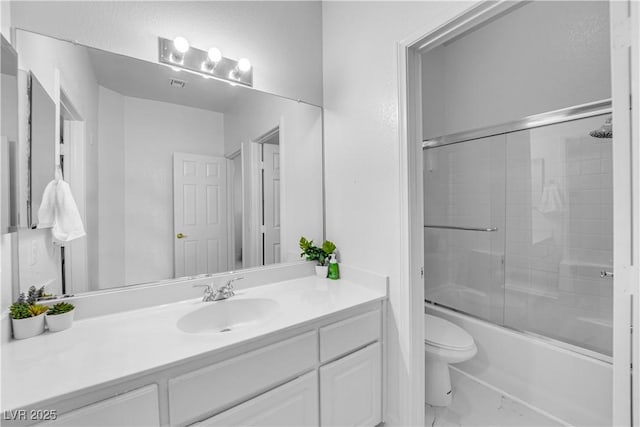 9155 Bush Poppy Ave, Las Vegas, NV 89147 - full bath featuring toilet, marble finish floors, vanity, and enclosed tub / shower combo