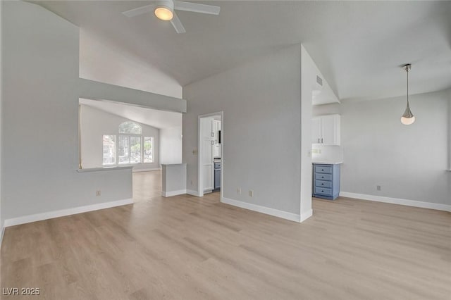 unfurnished living room featuring baseboards, light wood-type flooring, a ceiling fan, and lofted ceiling