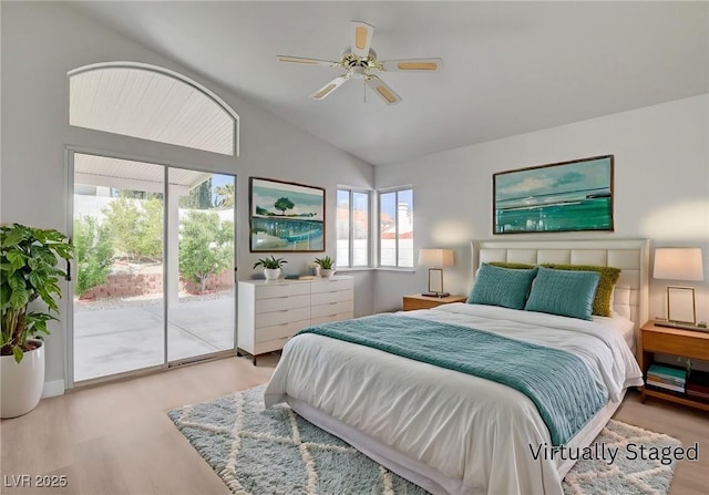 bedroom with high vaulted ceiling, access to outside, ceiling fan, and wood finished floors