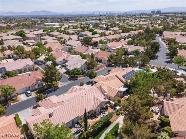 aerial view with a mountain view and a residential view