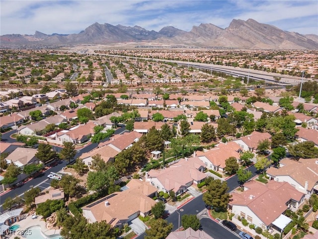 aerial view featuring a residential view and a mountain view
