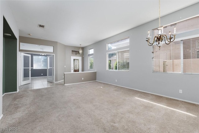1709 Pacific Panorama Pl, Las Vegas, NV 89144 - unfurnished living room featuring carpet, a chandelier, and baseboards