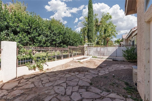 1709 Pacific Panorama Pl, Las Vegas, NV 89144 - view of patio / terrace featuring a garden