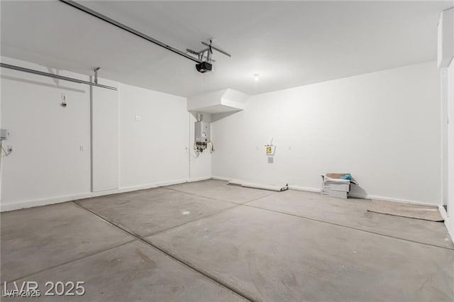 garage with water heater and a garage door opener