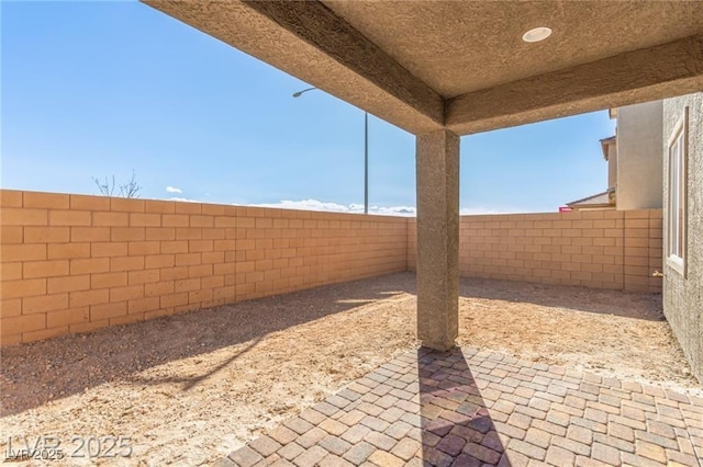 view of patio with a fenced backyard
