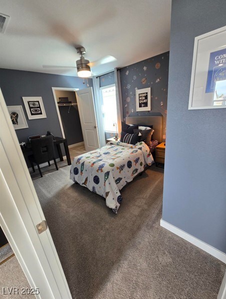 bedroom featuring baseboards, visible vents, and carpet floors