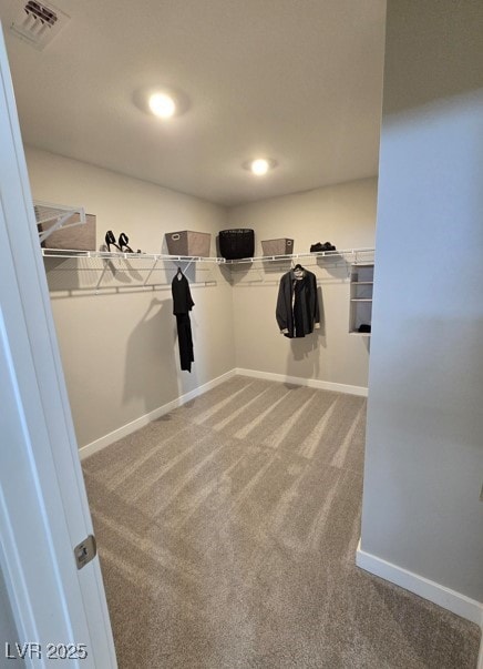 walk in closet with carpet flooring and visible vents