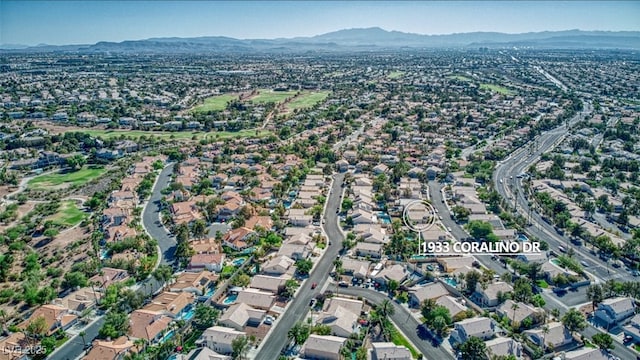 bird's eye view featuring a residential view and a mountain view