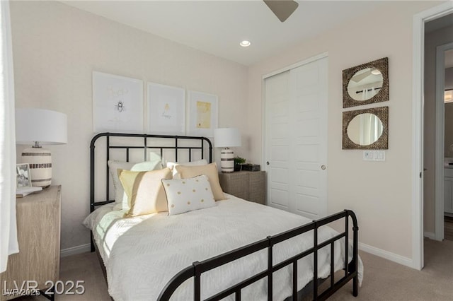 carpeted bedroom featuring recessed lighting, baseboards, a ceiling fan, and a closet