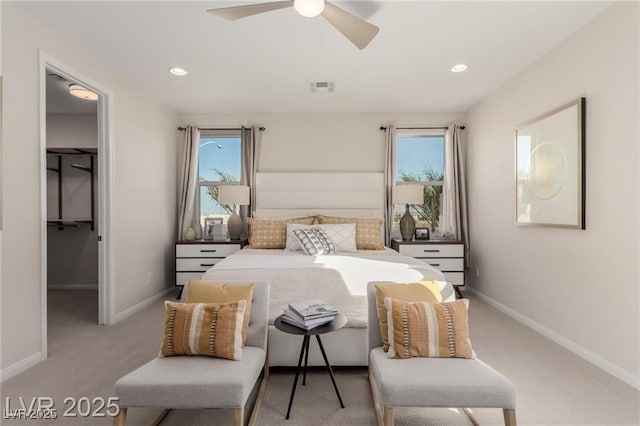 bedroom featuring recessed lighting, light carpet, visible vents, and baseboards