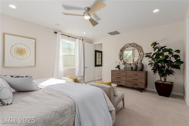 bedroom with baseboards, visible vents, recessed lighting, light colored carpet, and a ceiling fan
