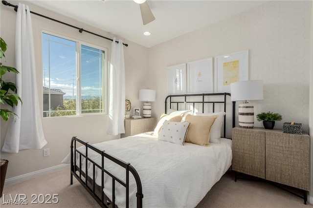 carpeted bedroom with ceiling fan, baseboards, and recessed lighting