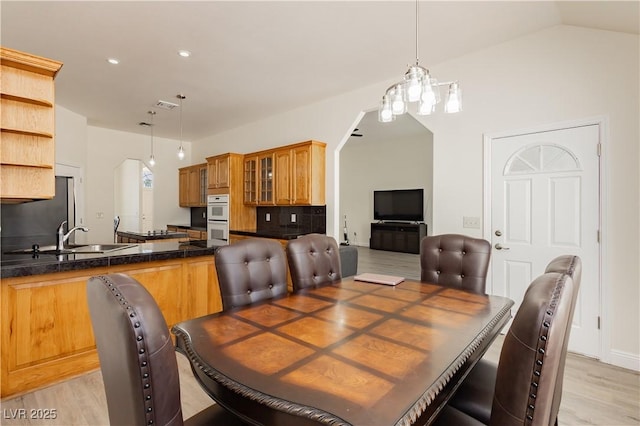 dining room with visible vents, light wood-style flooring, and recessed lighting