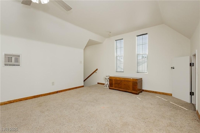 bonus room with carpet flooring, ceiling fan, lofted ceiling, and visible vents