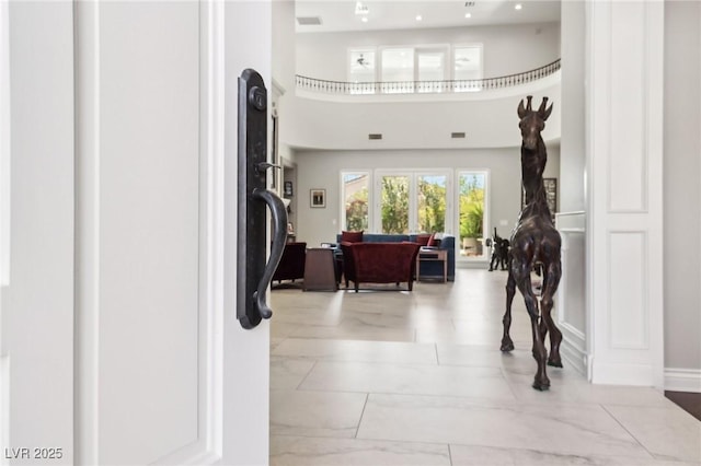 2338 Dolphin Ct, Henderson, NV 89074 - foyer featuring a towering ceiling and light marble finish floors