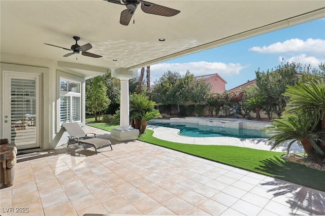 view of patio / terrace featuring an outdoor pool and ceiling fan