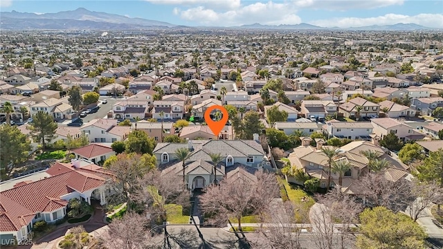 bird's eye view featuring a residential view and a mountain view