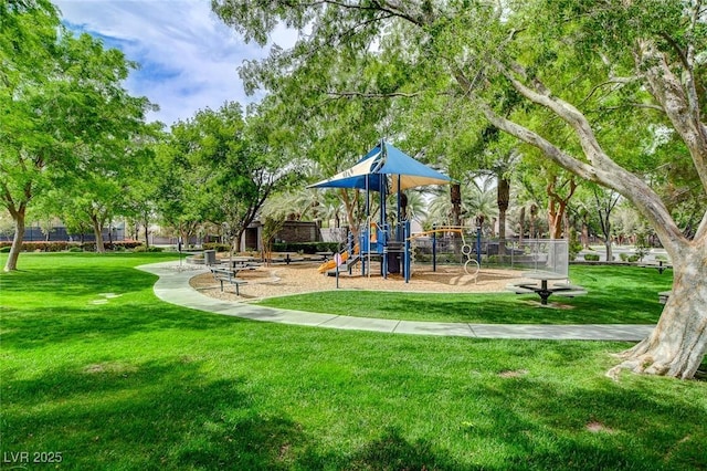 community playground featuring a yard