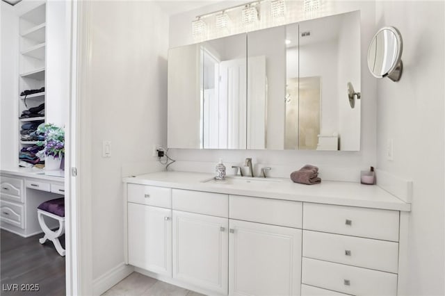 2338 Dolphin Ct, Henderson, NV 89074 - bathroom with vanity and baseboards