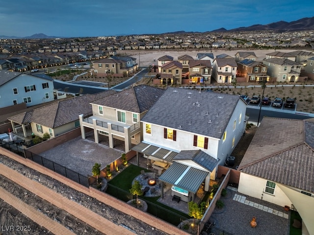 aerial view featuring a residential view and a mountain view