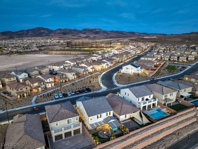 aerial view featuring a mountain view and a residential view