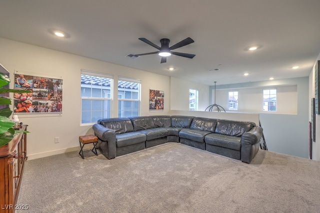 carpeted living room featuring visible vents, ceiling fan, recessed lighting, and baseboards