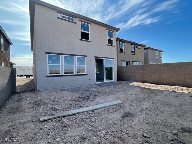 9556 Hinson St, Las Vegas, NV 89139 - back of property featuring stucco siding