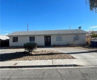 893 Laramore Dr, Las Vegas, NV 89119 - single story home with curved driveway